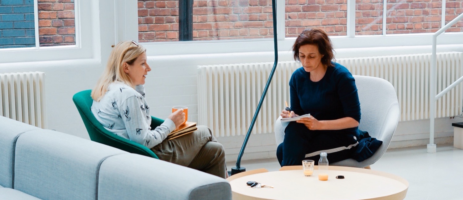 Two women talking